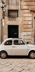 A Small White Car Plakat - Posterbox.dk